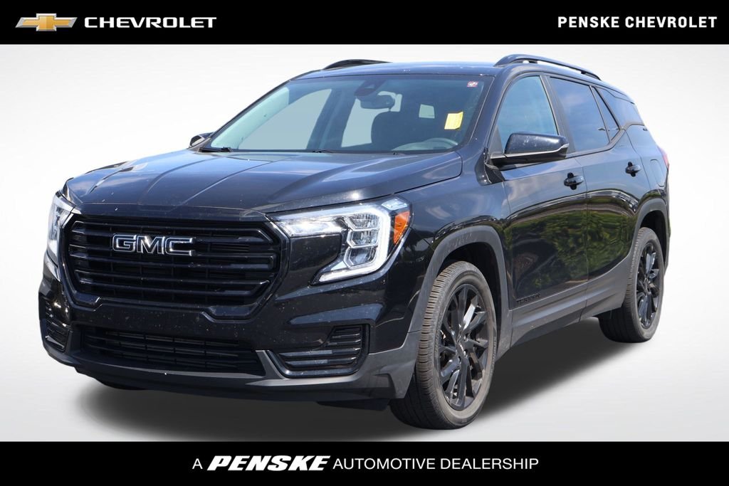 Used 2023 Ebony Twilight Metallic GMC SLE image 1