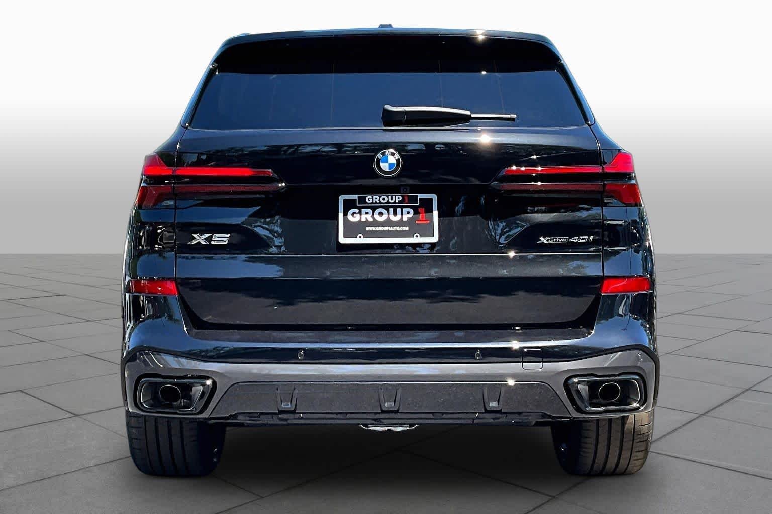 New 2026 Black Sapphire Metallic BMW xDrive40i image 4