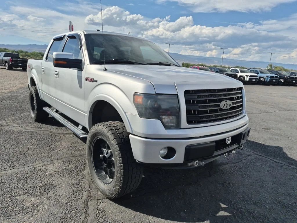 Used 2014 Ingot Silver Ford FX4 image 1