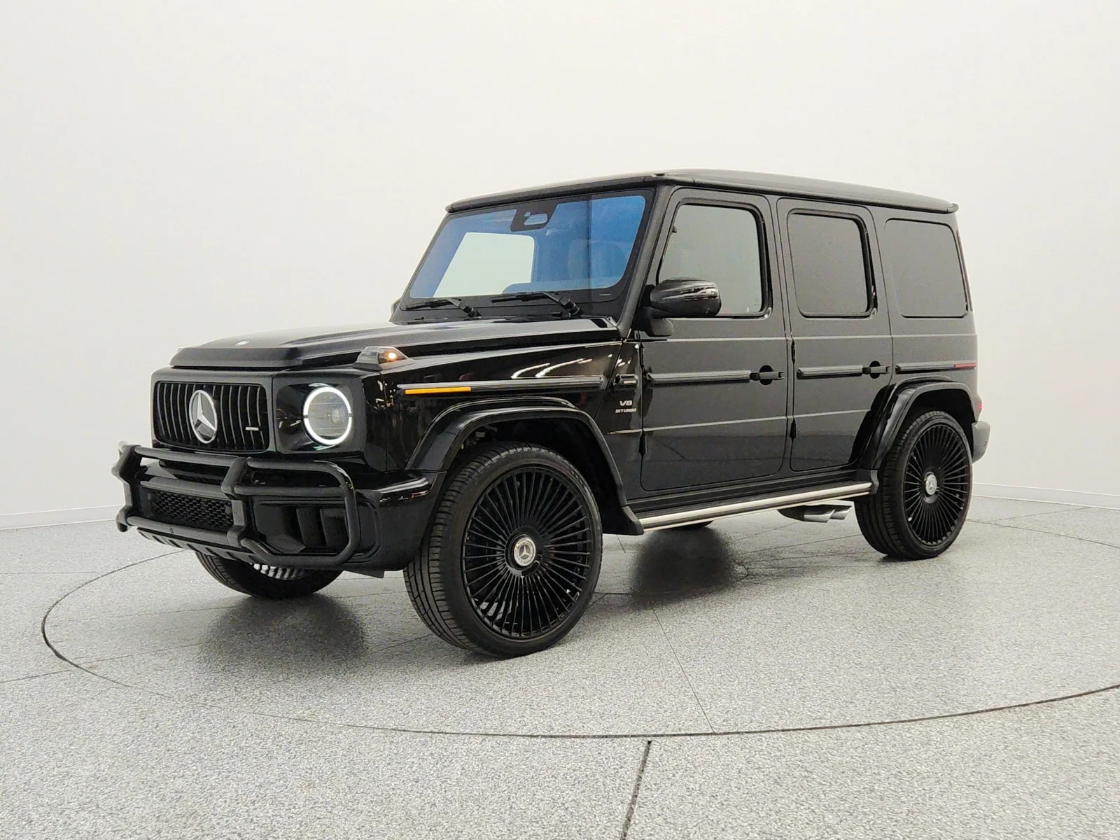 Used 2025 Obsidian Black Metallic Mercedes-Benz AMG® G 63 SUV image 1