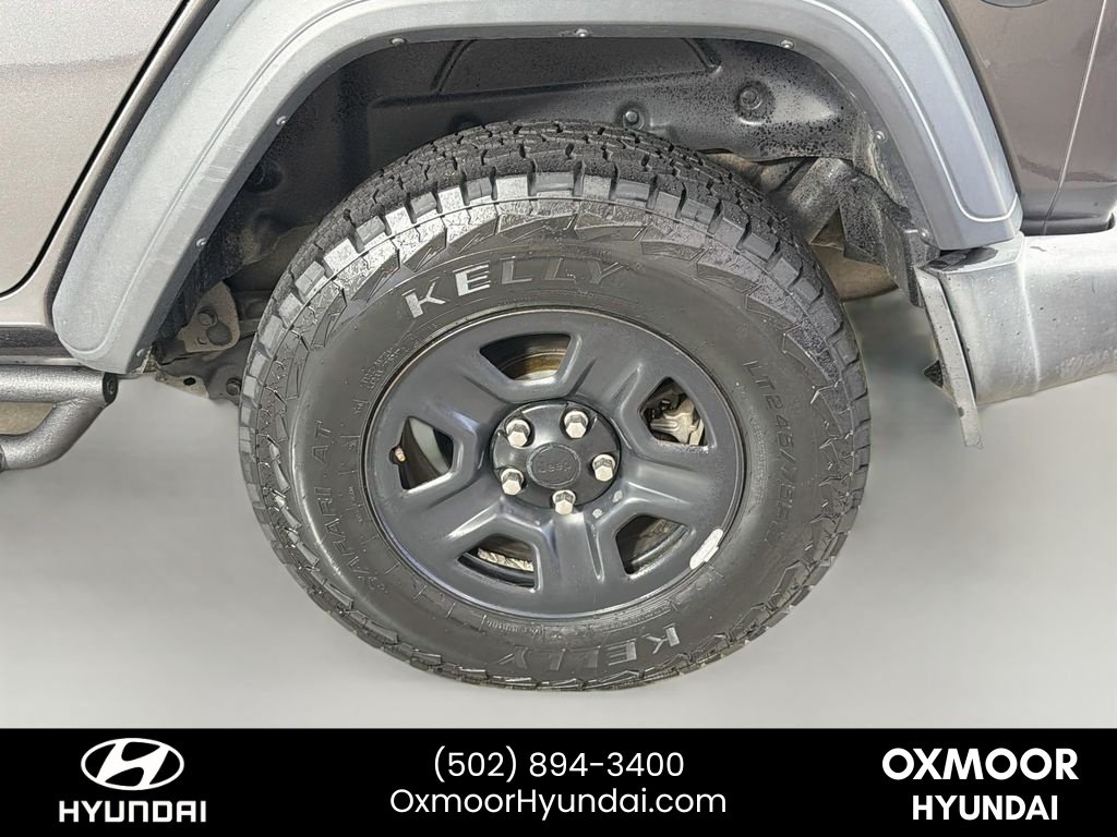 Used 2018 Granite Crystal Metallic Clearcoat Jeep Sport image 29