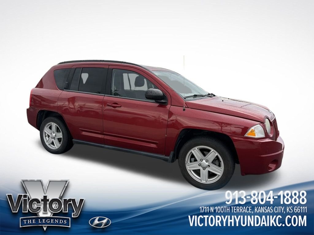 Used 2010 Red Jeep Sport image 4