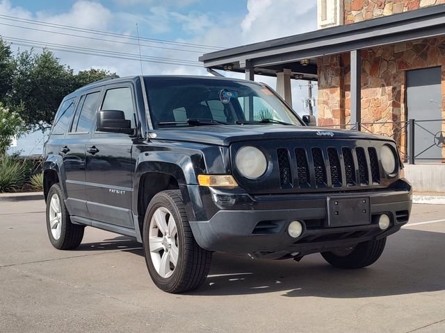 Used 2012 Black Jeep Latitude image 1