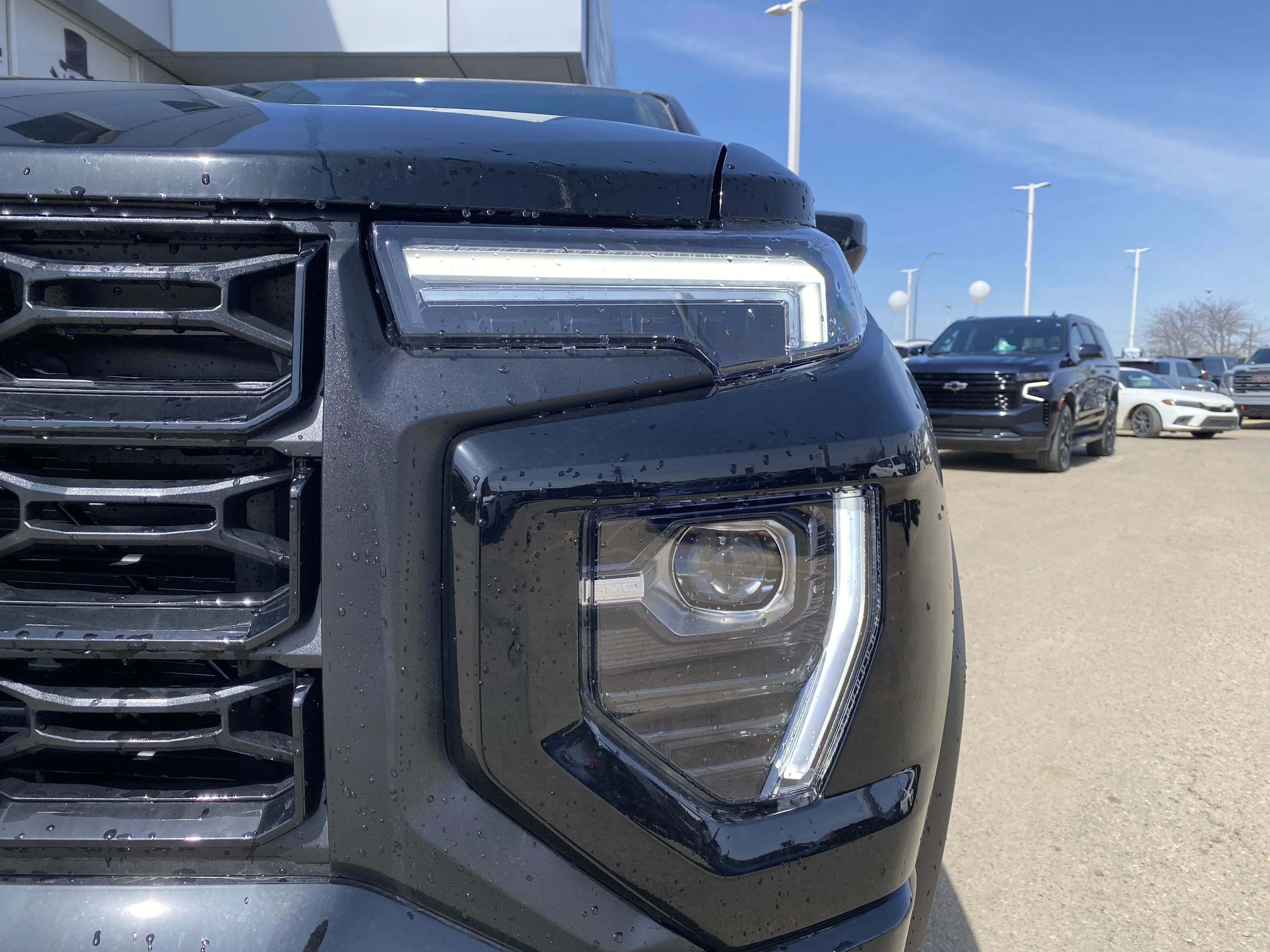 New 2026 ONYX BLACK GMC 4WD Elevation image 9