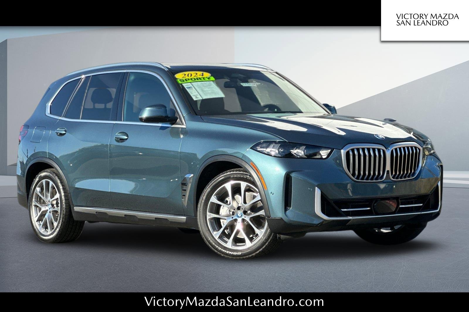 Used 2024 Blue BMW xDrive50e image 1