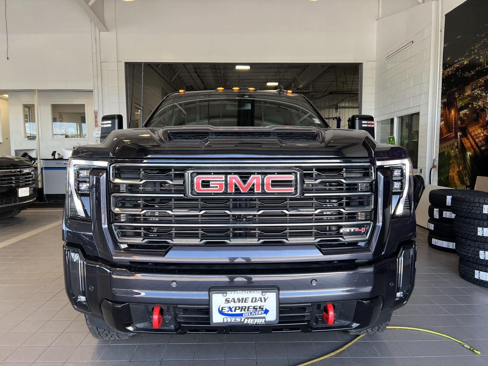 Used 2024 Titanium Rush Metallic GMC AT4 image 2