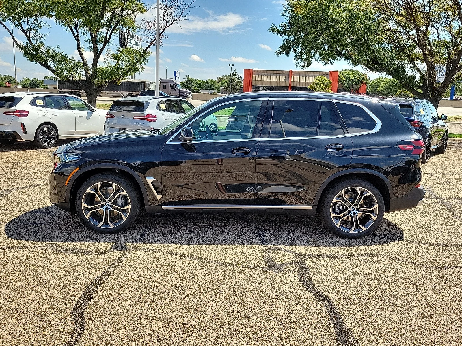 New 2026 Black Sapphire Metallic BMW xDrive40i All-Wheel Drive Sports Activity Vehicle image 2