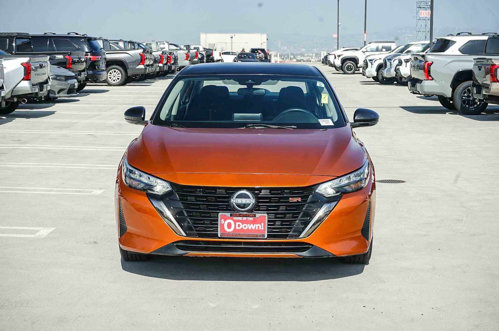 Used 2024 Monarch Orange Metallic/Super Black Nissan SR image 2