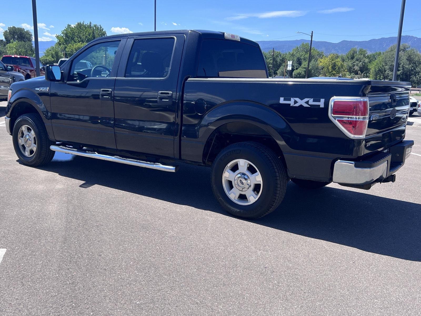 Used 2011 Tuxedo Black Metallic Ford XLT image 7