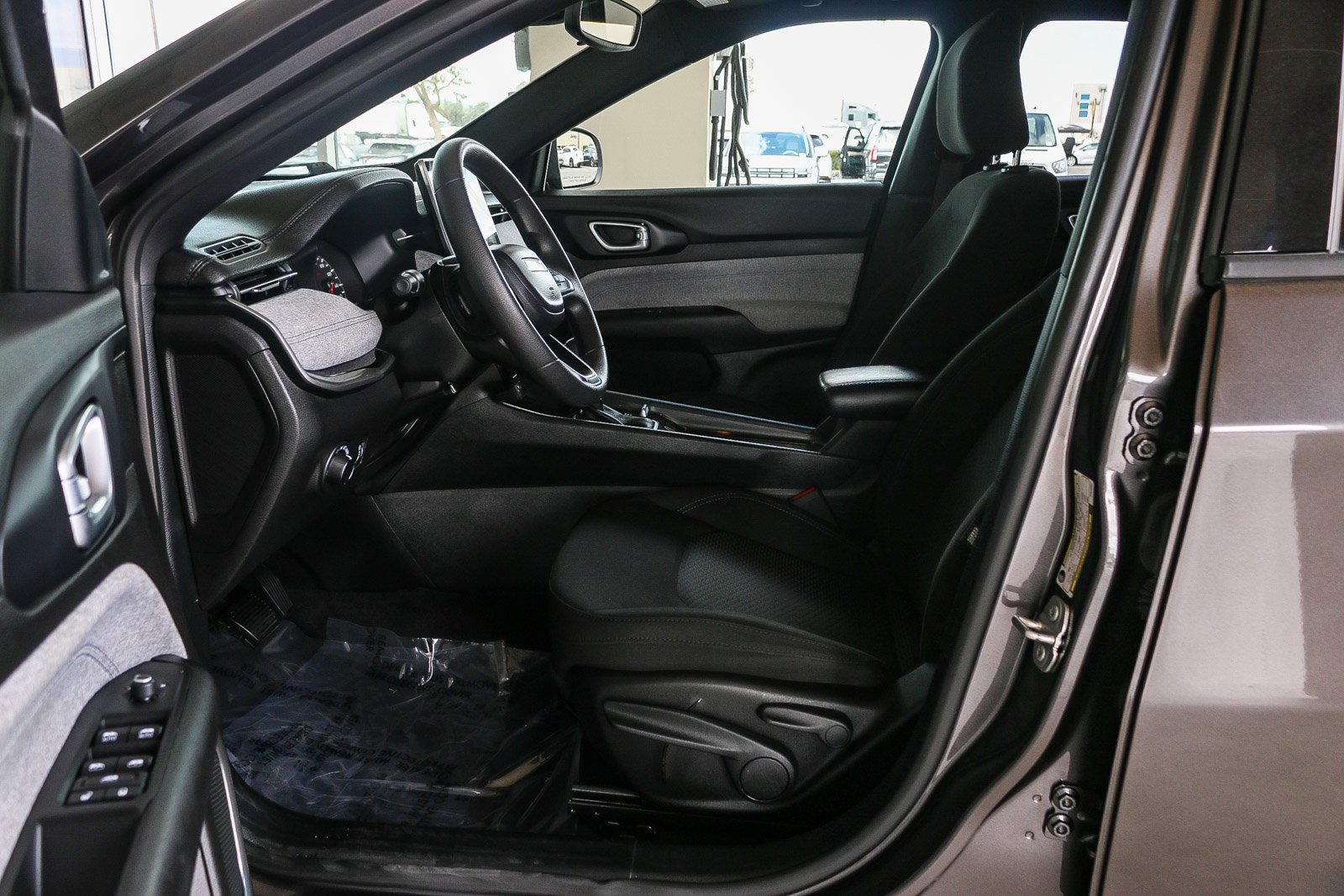 Used 2023 Granite Crystal Metallic Clearcoat Jeep Sport image 20