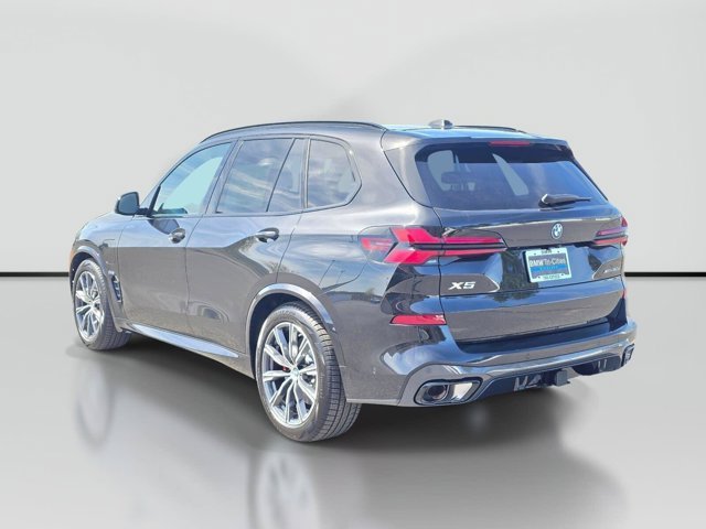 New 2026 Black Sapphire Metallic BMW xDrive50e image 4