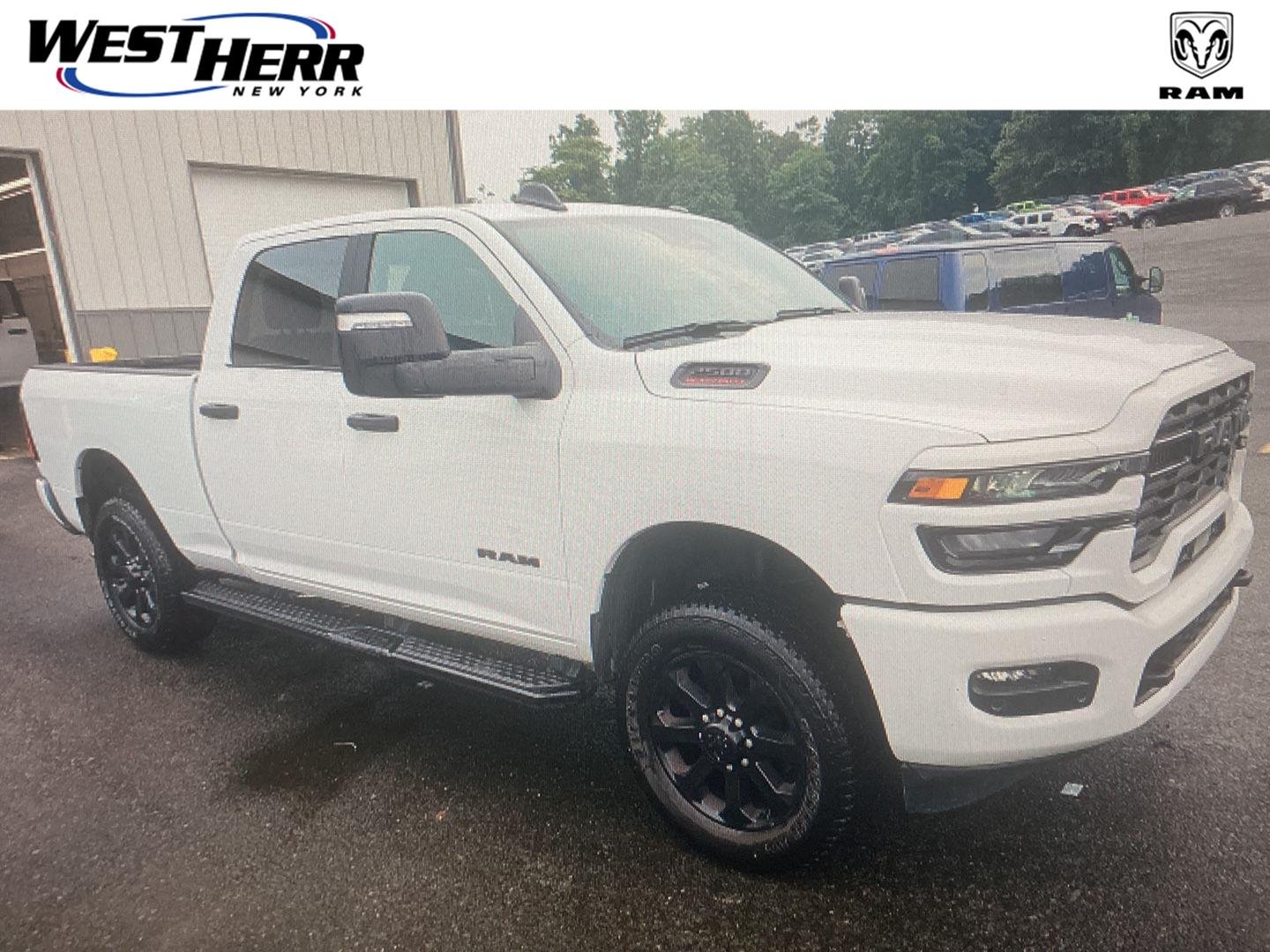 Used 2025 Bright White Clearcoat Ram Big Horn image 1