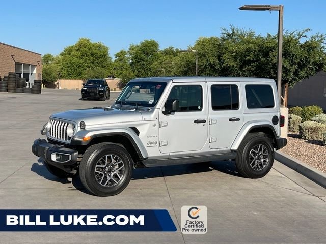 Used 2024 Silver Jeep Sahara image 1