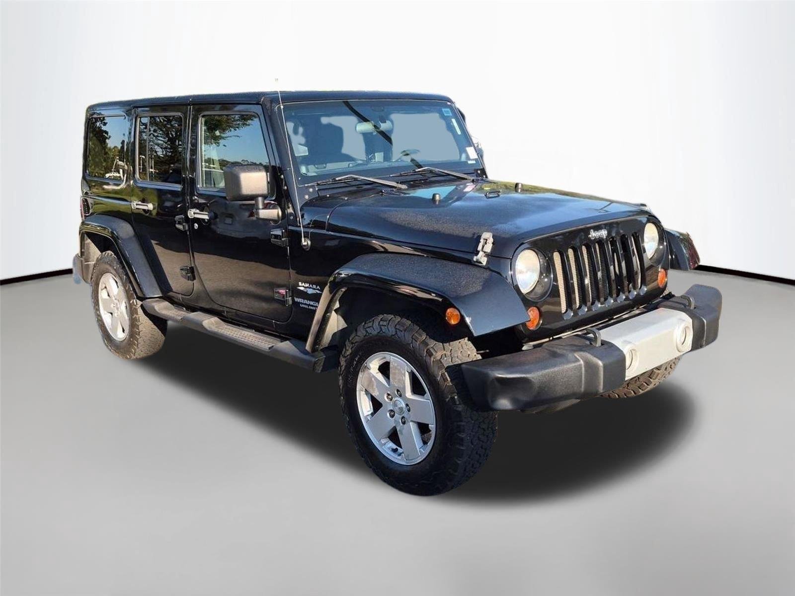 Used 2011 Black Clear Coat Jeep Sahara image 6