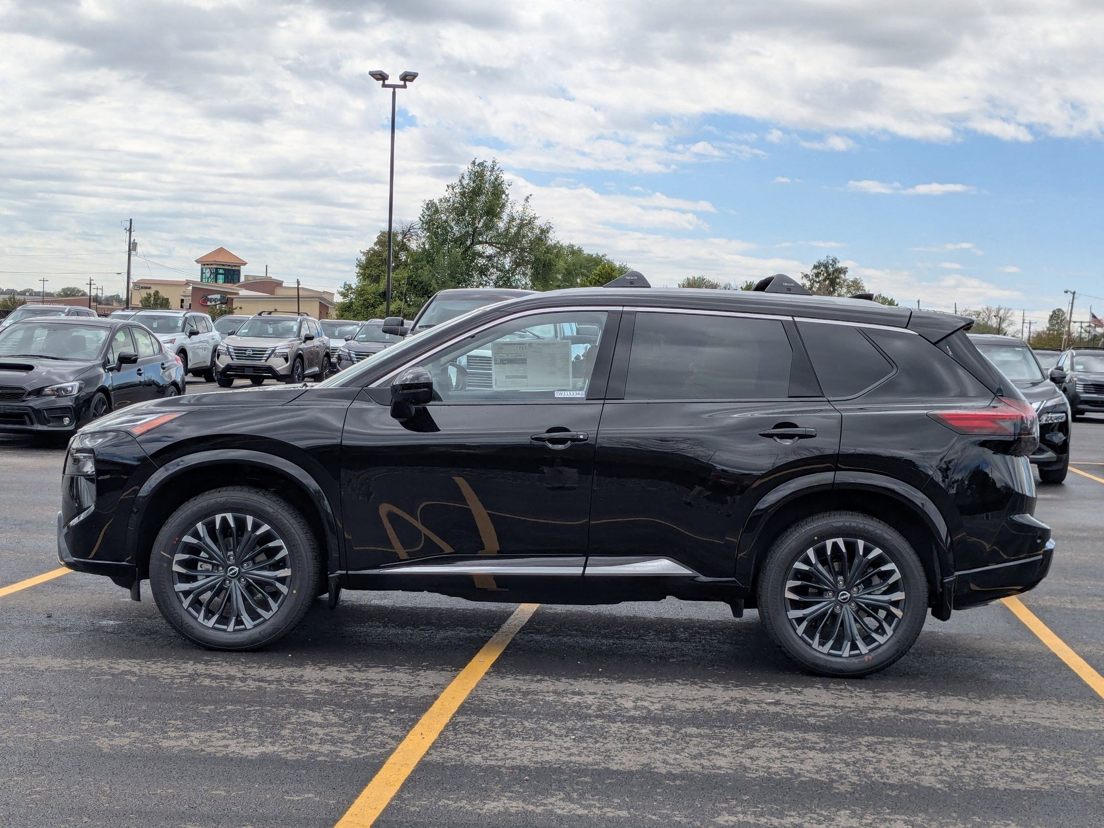 New 2026 Super Black Nissan Platinum image 7