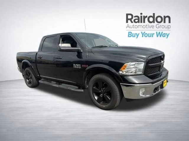Used 2015 Brilliant Black Crystal Pearlcoat Ram Outdoorsman image 1