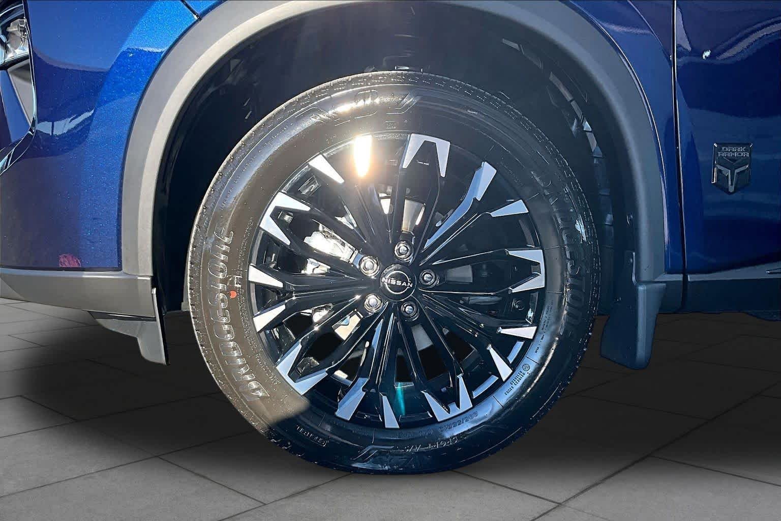New 2027 Deep Ocean Blue Pearl Nissan Dark Armor image 11