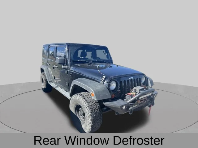 Used 2011 Black Jeep Unlimited Sport image 5