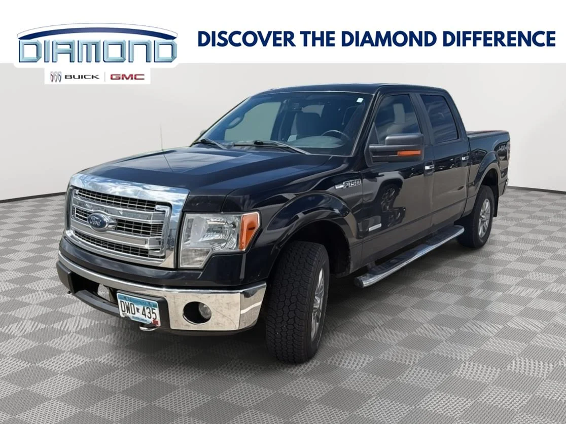 Used 2013 Tuxedo Black Metallic Ford XL image 1