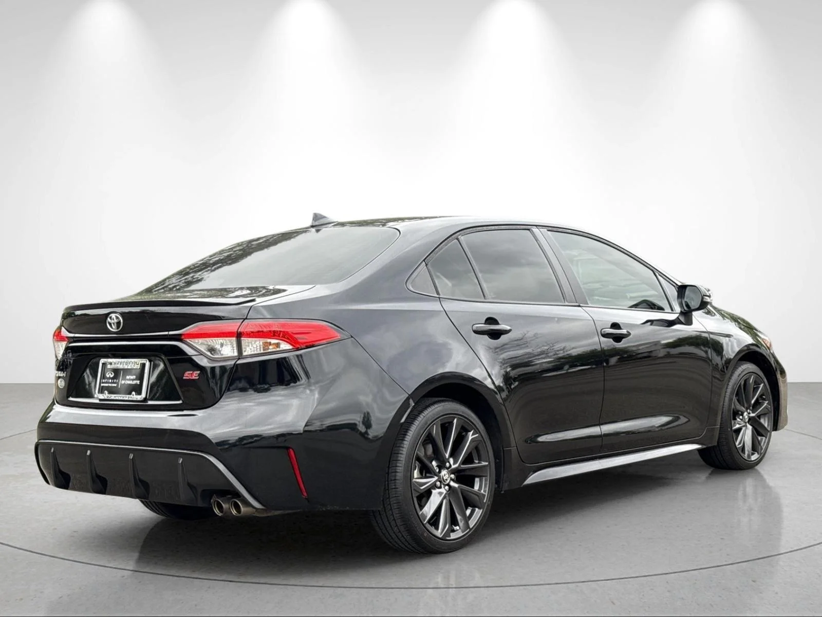 Used 2023 Midnight Black Metallic Toyota SE image 5
