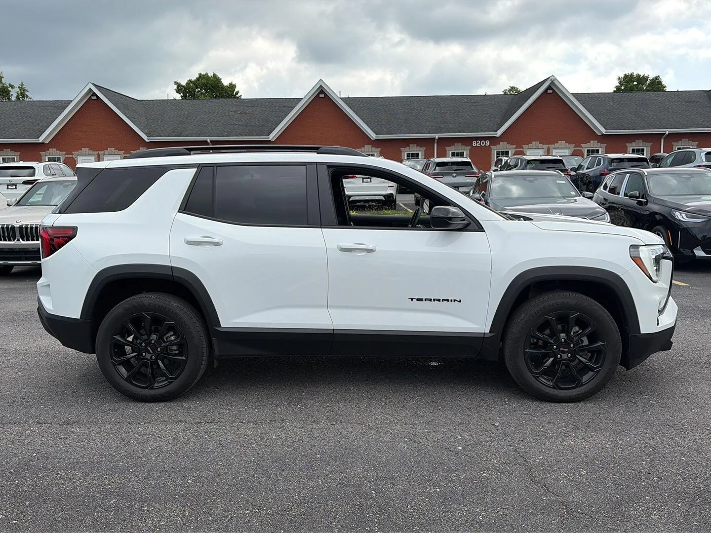 Used 2026 Summit White GMC AWD Elevation image 3