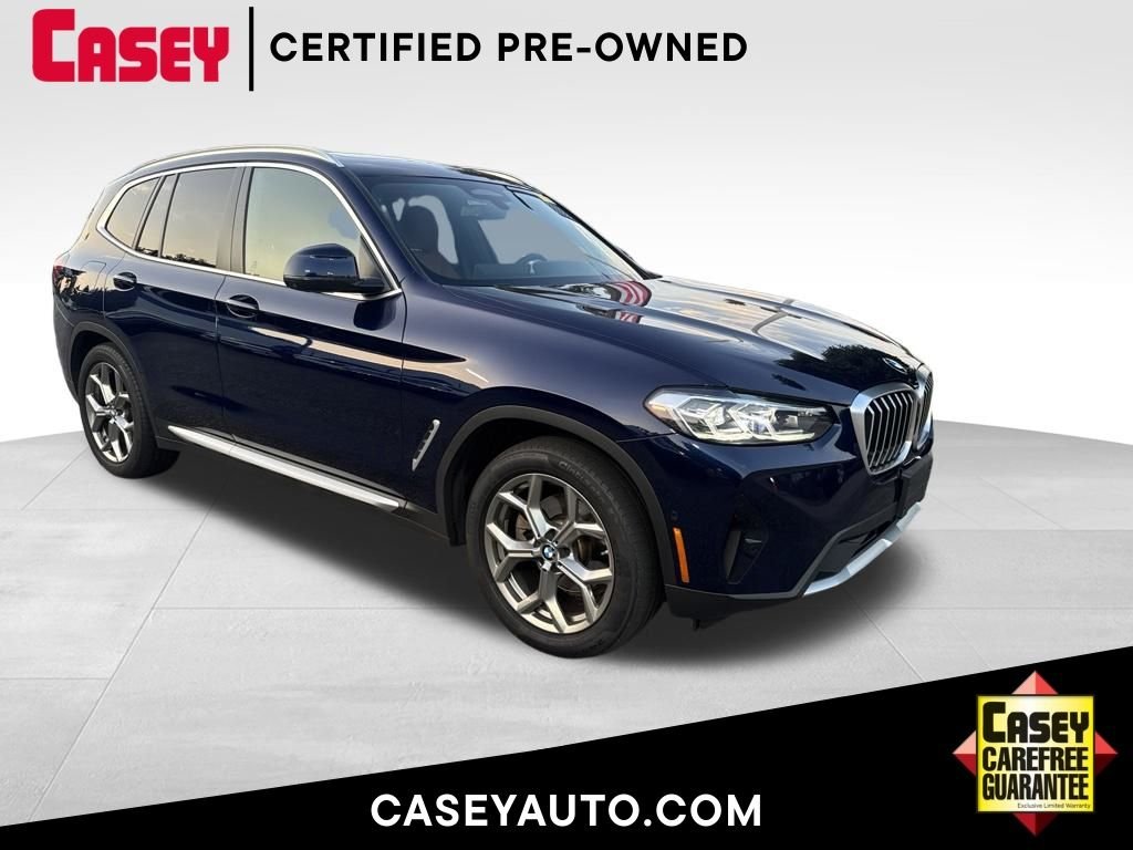 Certified Used 2023 Tanzanite Blue II Metallic BMW xDrive30i image 1