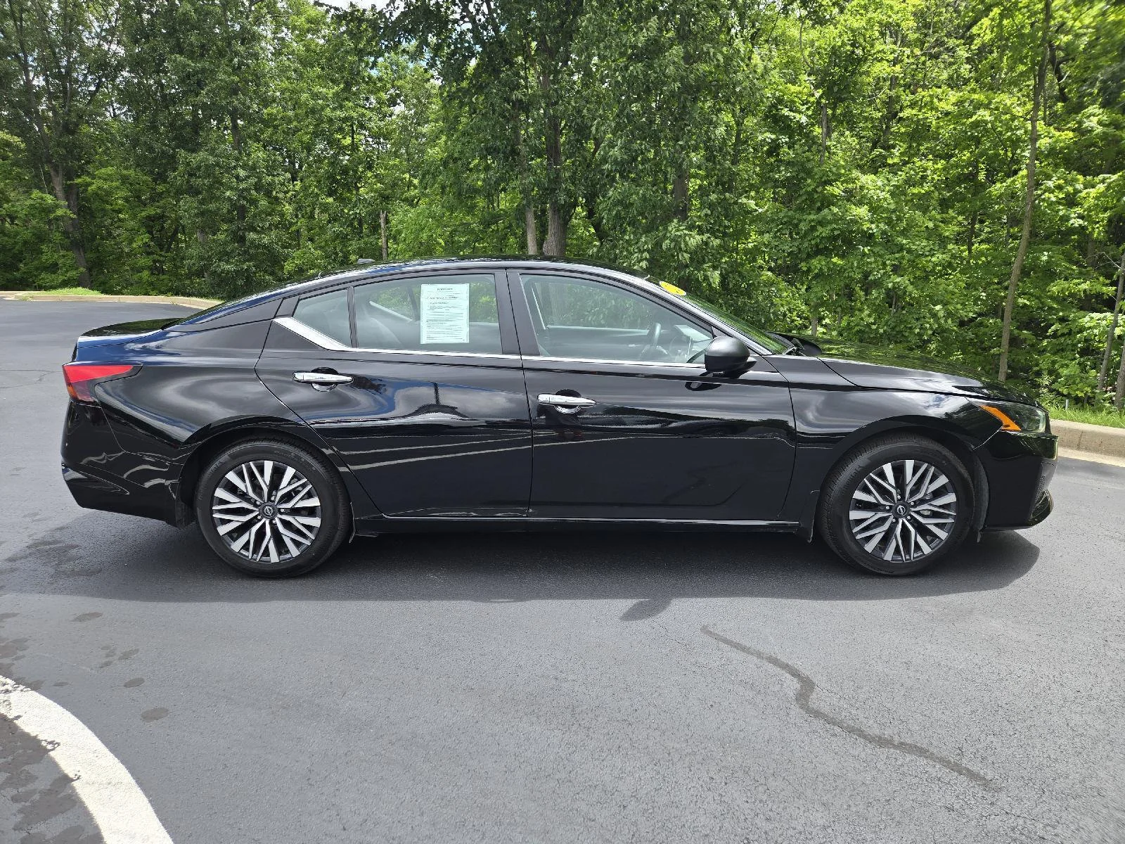 Used 2025 Super Black Nissan SV image 2