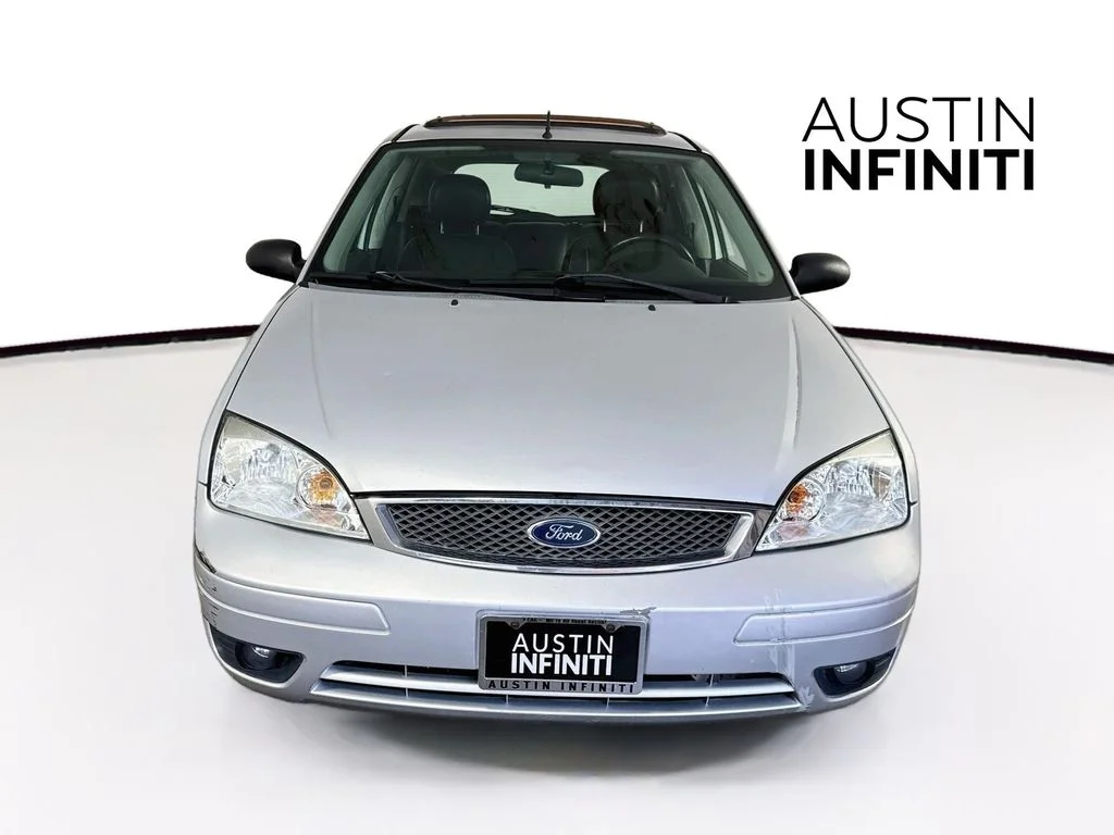 Used 2007 Ford Focus ZX5 SE with VIN 1FAFP37NX7W321890 for sale in Austin, TX