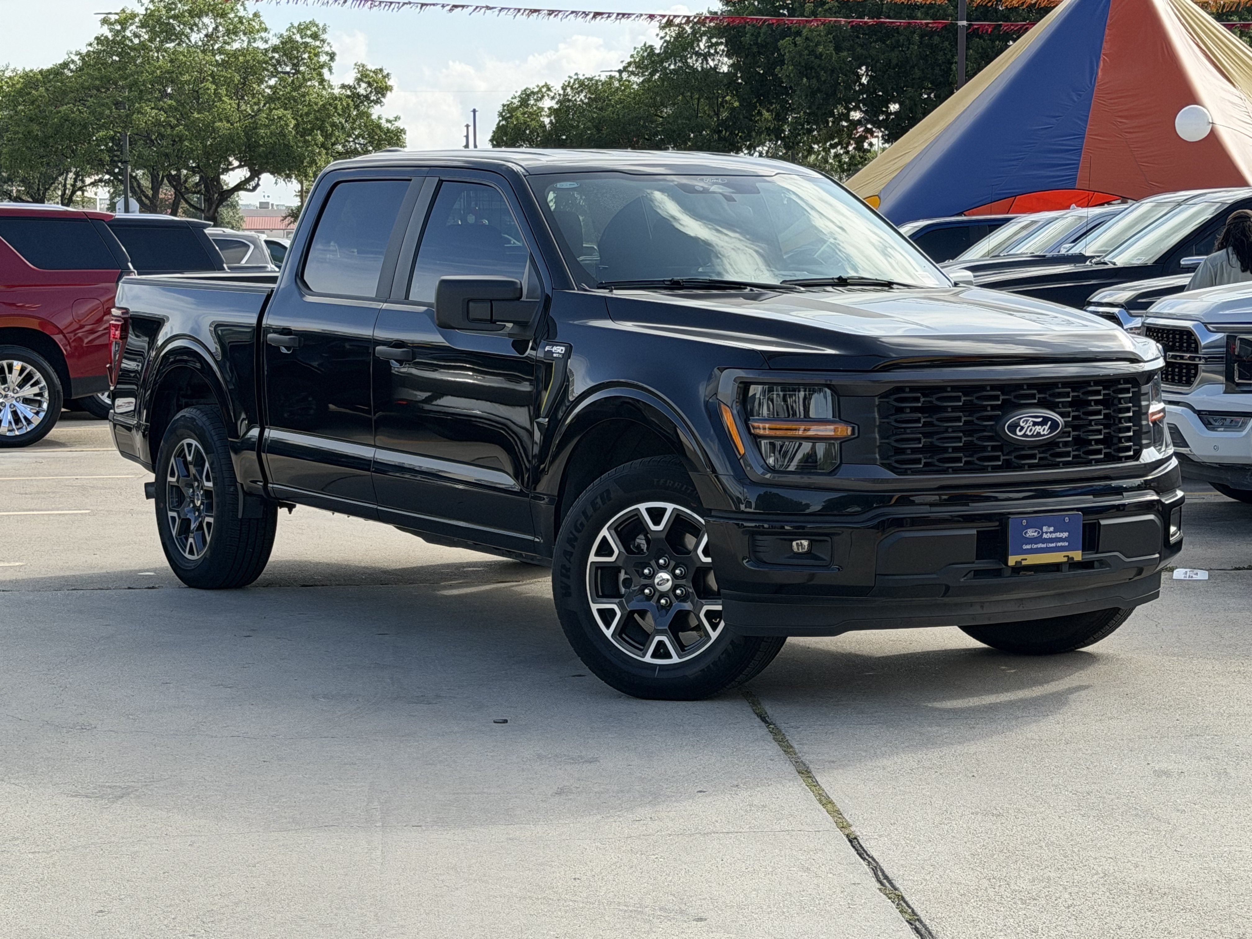 Used 2024 Agate Black Metallic Ford STX image 1