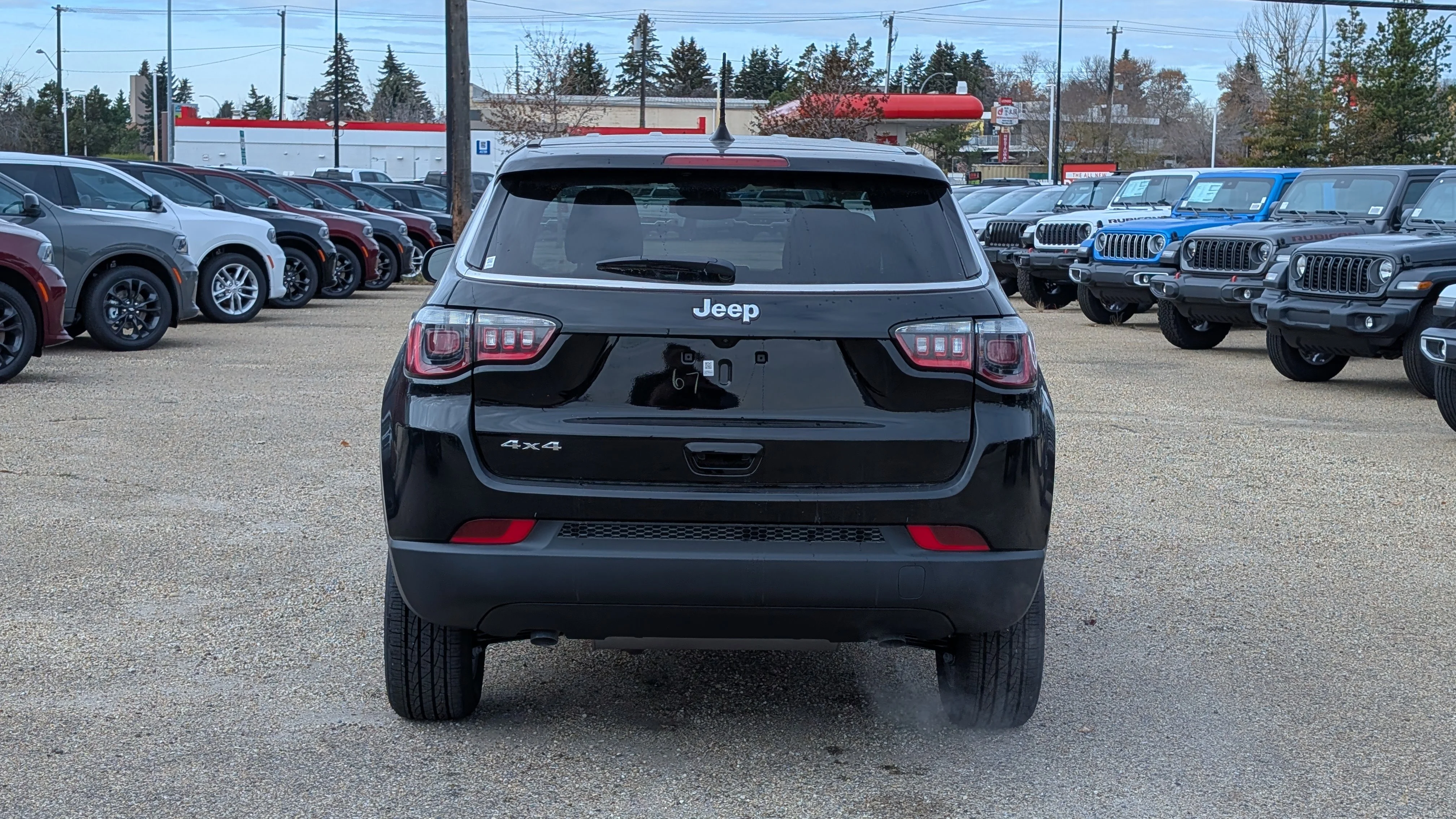 New 2026 Diamond Black Crystal Pearl Jeep Sport image 5