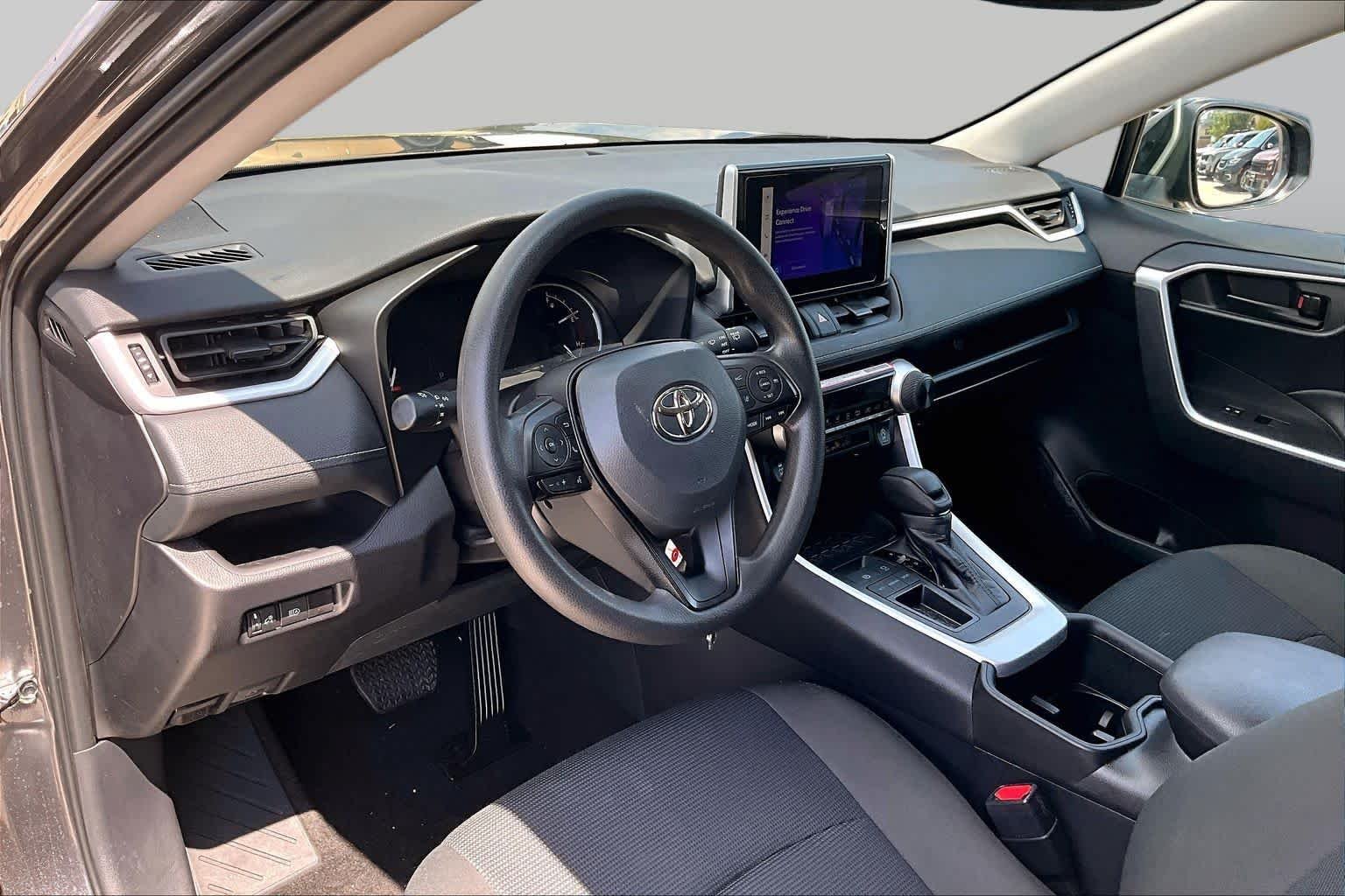 Used 2024 Magnetic Gray Metallic Toyota LE image 16