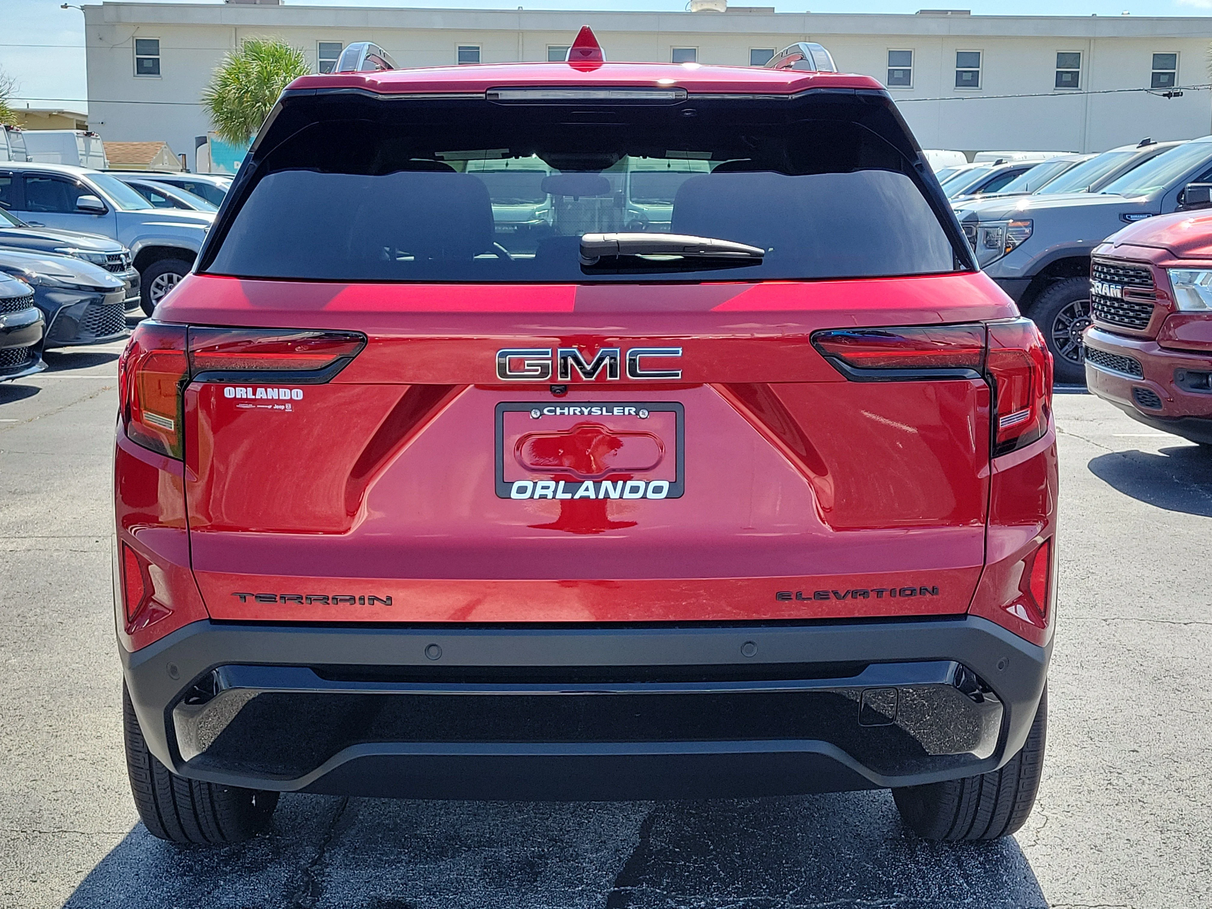 Used 2026 Volcanic Red Tintcoat GMC FWD Elevation image 6