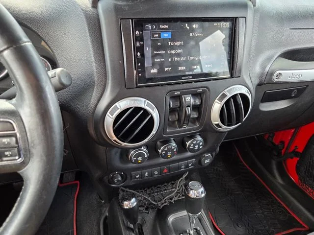 Used 2015 Red Jeep Unlimited Sahara image 21