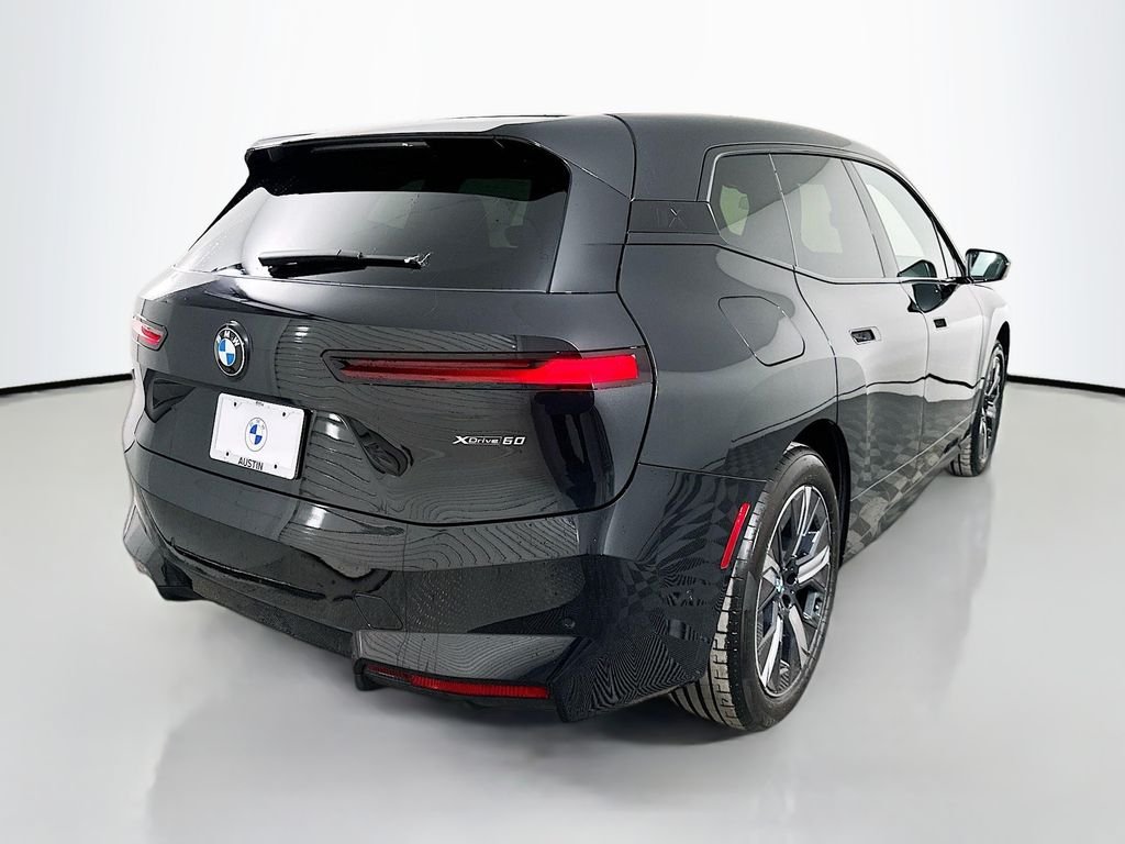 Used 2026 Black Sapphire Metallic BMW xDrive60 image 5