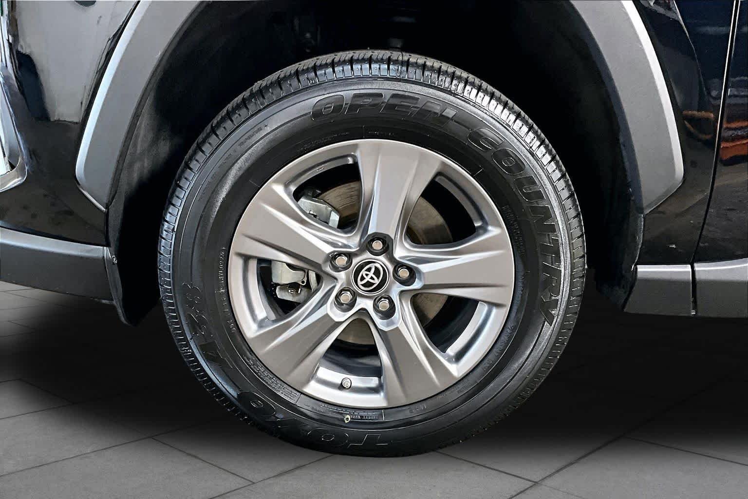 Used 2024 Midnight Black Metallic Toyota Hybrid LE image 11