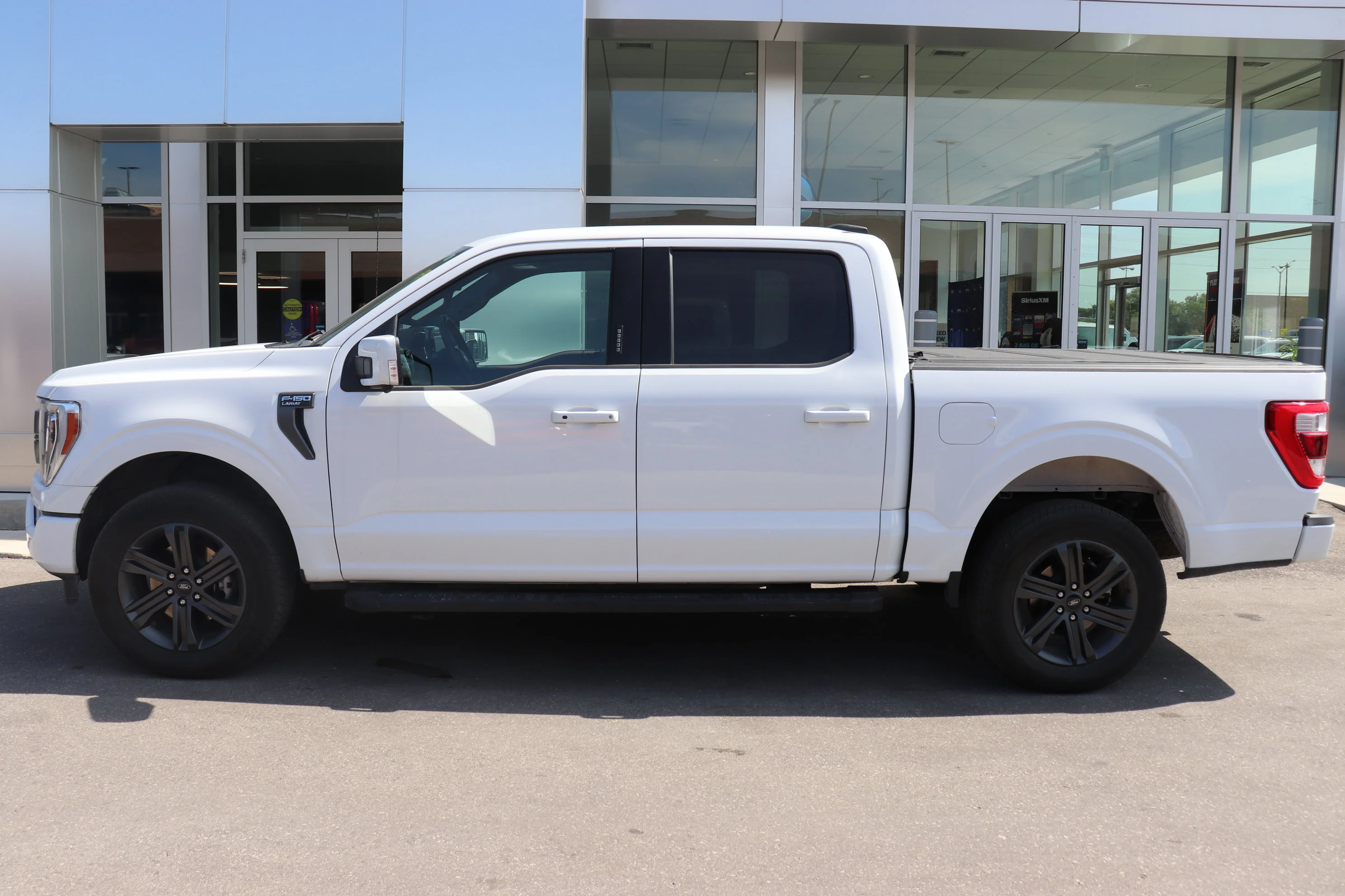 Certified Used 2023 Silver Ford Lariat 4WD SuperCrew 5.5