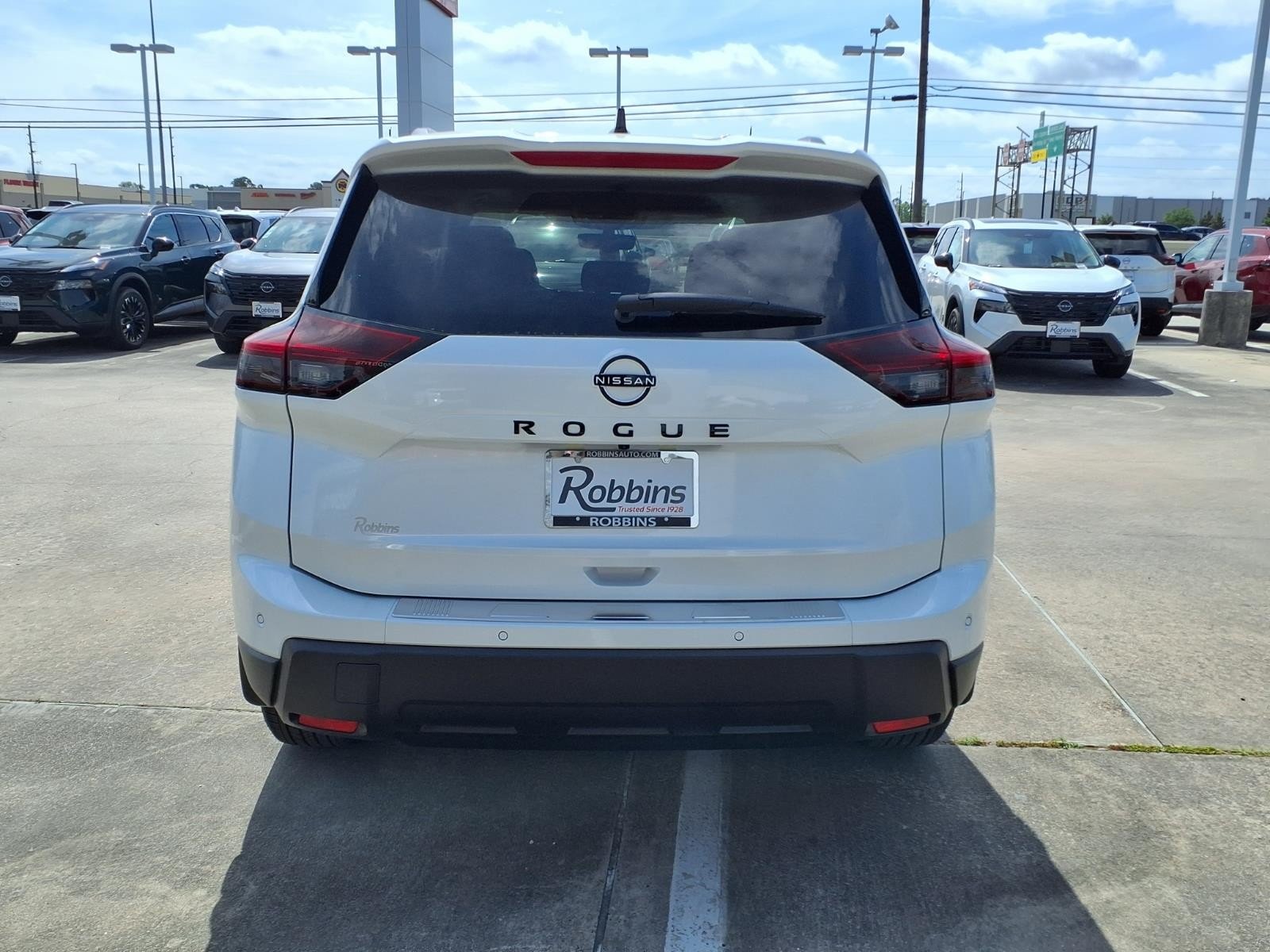 2026 Nissan Rogue Dark Armor™ White at Robbins Nissan