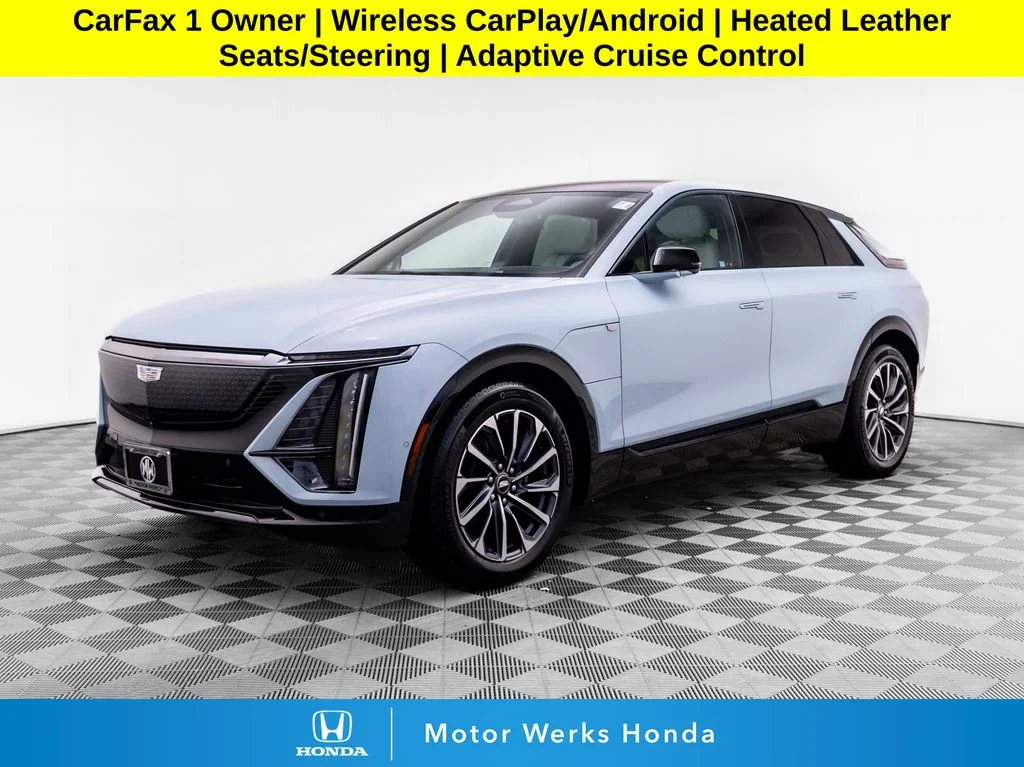 Used 2024 Blue Cadillac Sport image 1