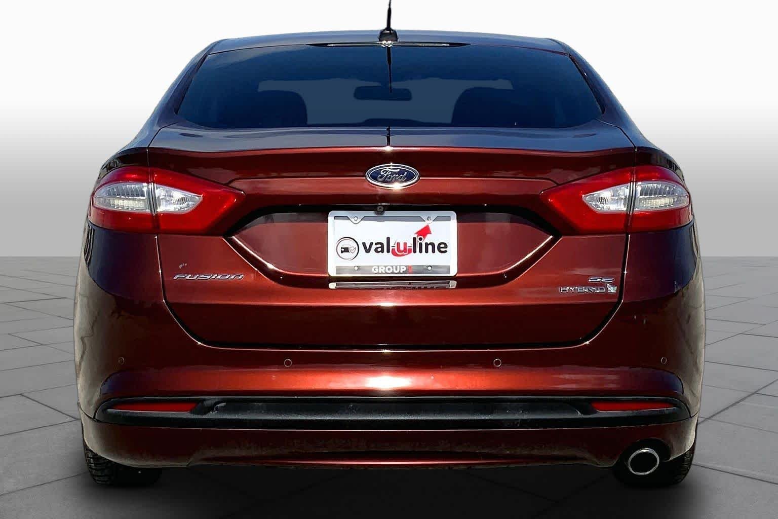 Used 2016 Bronze Fire Metallic Tinted Clearcoat Ford SE Hybrid image 5