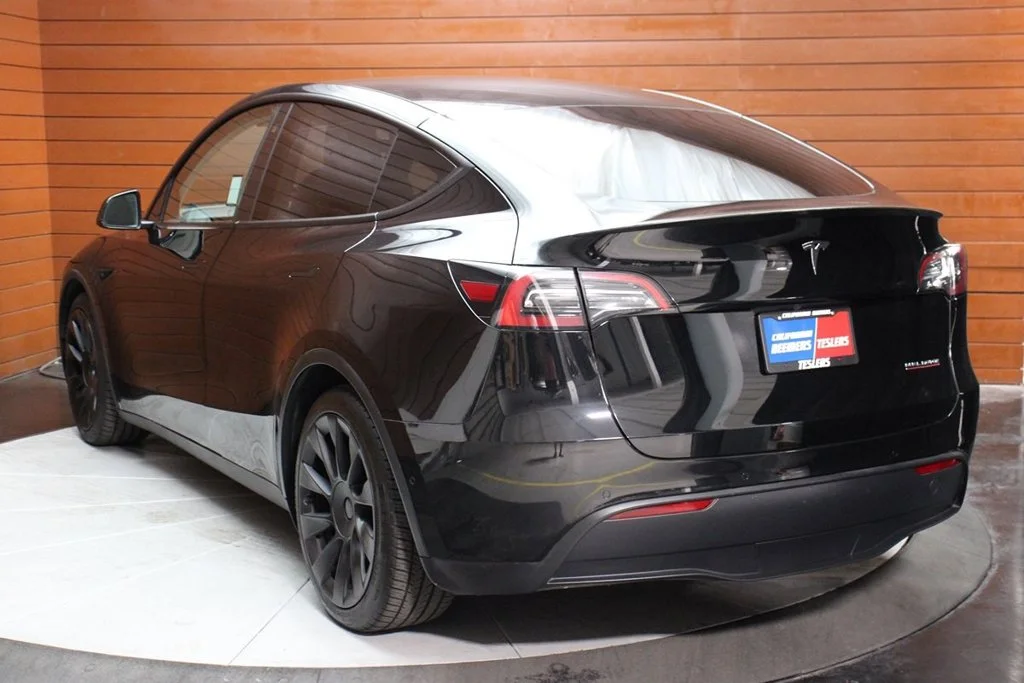 Used 2022 Solid Black Tesla Performance image 5