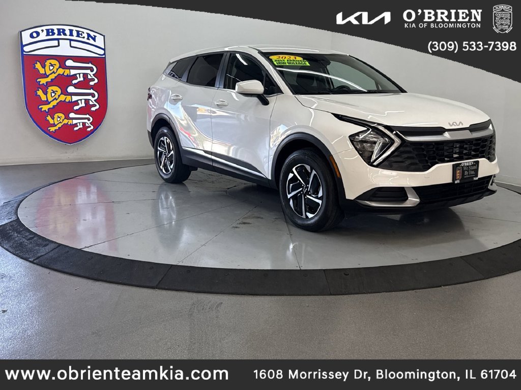Used 2023 Snow White Pearl Kia LX image 1