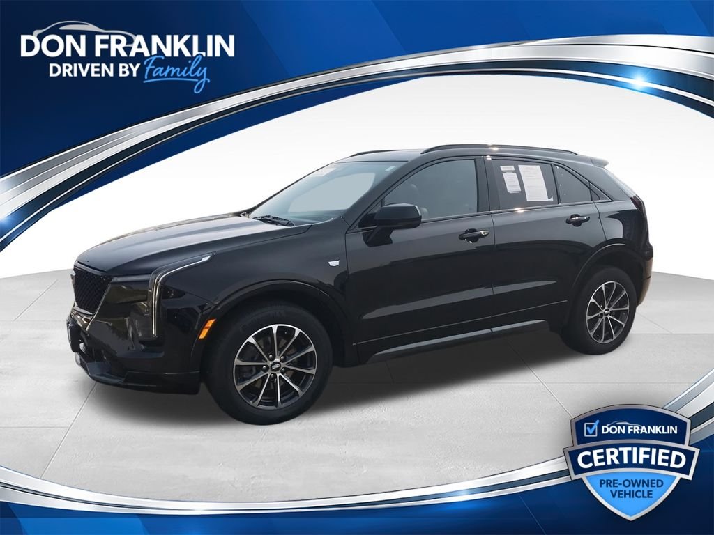 Used 2024 Black Cadillac Sport image 1