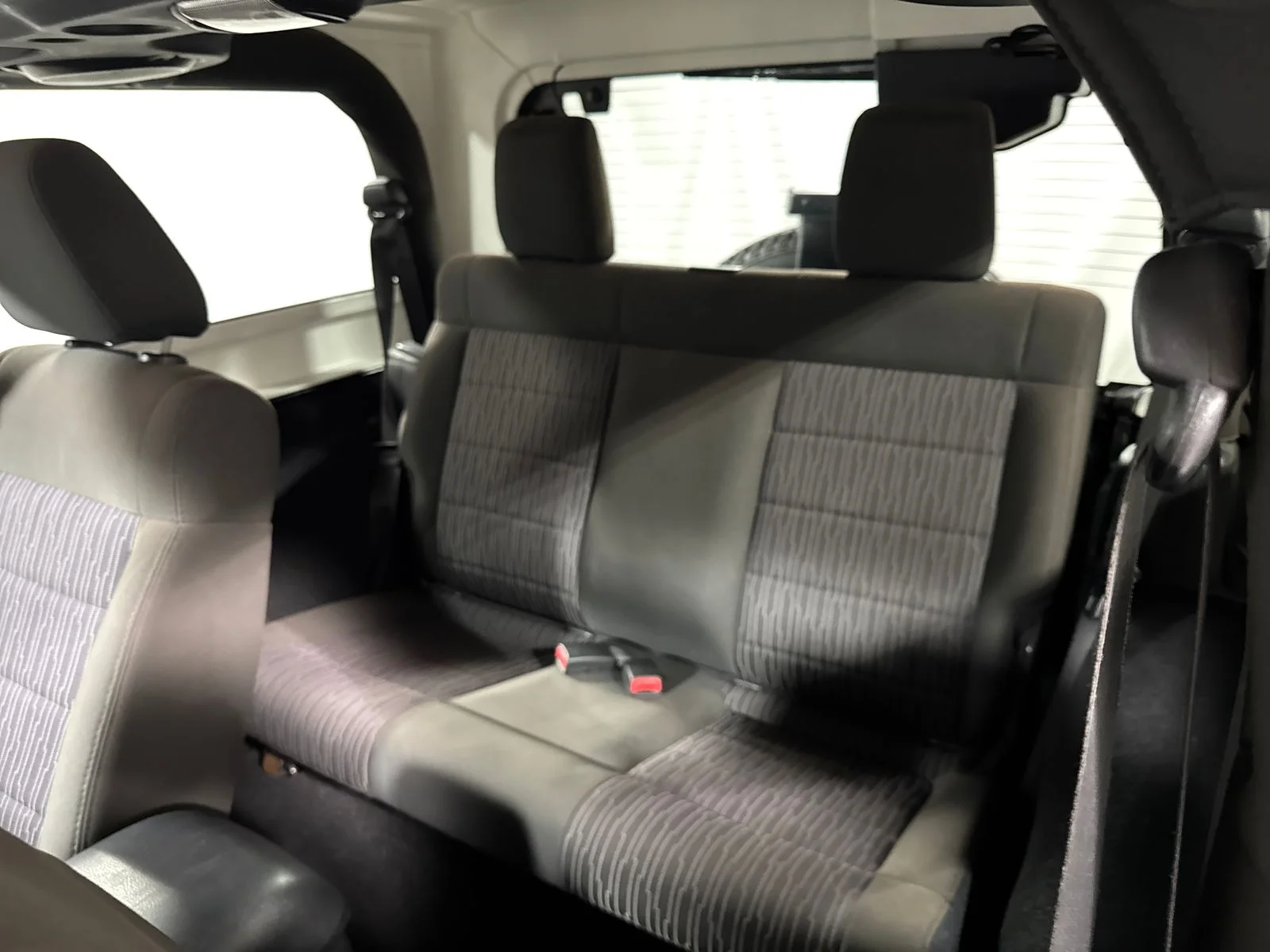 Used 2012 Black Clearcoat Jeep Sahara image 5