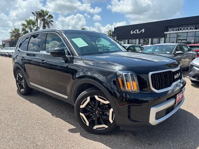 Used 2024 Black Kia EX image 1