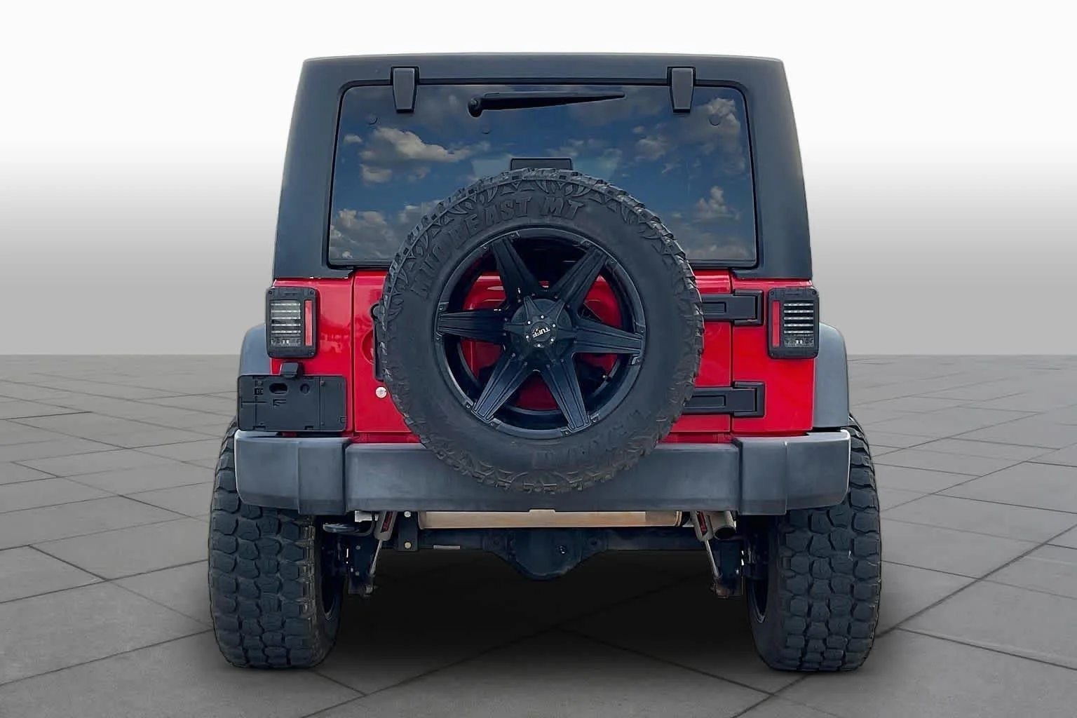 Used 2015 Firecracker Red Clear Coat Jeep Sport image 4