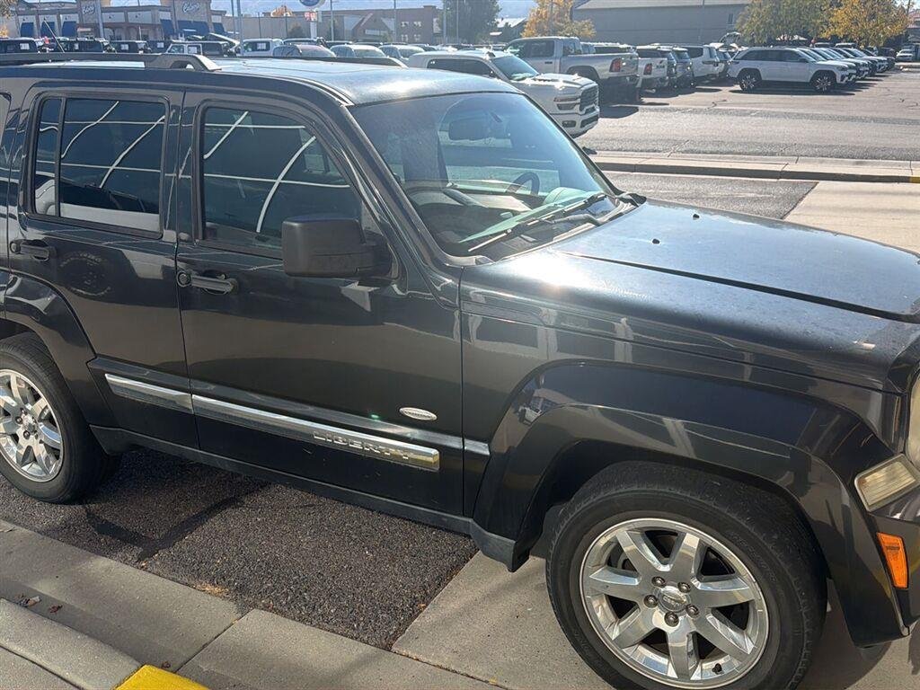 Used 2012 Brilliant Black Crystal Pearl Jeep Sport Latitude image 7