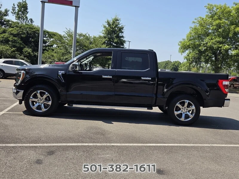Used 2021 Black Metallic FORD LARIAT 4WD SUPERCREW 5.5