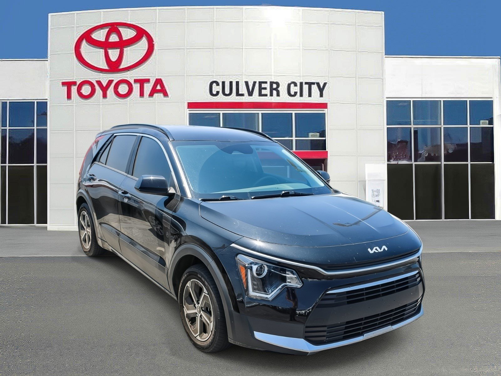 Used 2024 Aurora Black Kia LX image 1