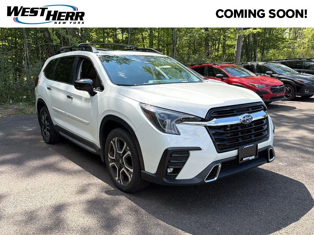 Used 2024 Crystal White Pearl Subaru Touring image 1