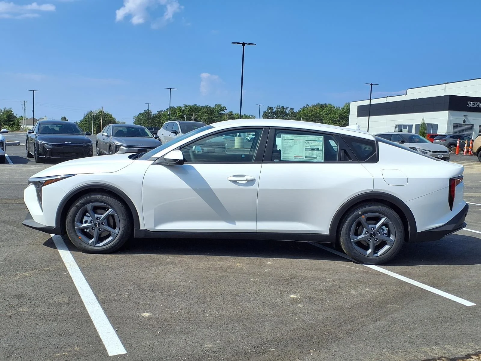 New 2026 Snow White Pearl Kia LXS image 12